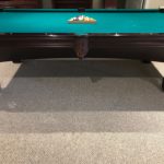 9ft X 5 Ft Brunswick Pool Table With Brunswick Rack And Many Cue Sticks